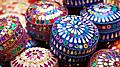 Colorful handmade decor in a street market in India.