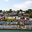 View of the colorful houses of Ringaskiddy Ireland from seaside.