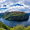 A snowcapped fjord in Geiranger, Norway