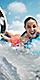 girl enjoying riptide ride in water slide