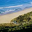 View of the beach landscape with a trail leading directly to the beach in Hobart, Tasmania