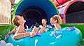 Mom and Daughters Enjoying Storm Surge at Cat6 Waterpark