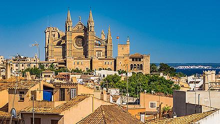 The Palma de Mallorca, Spain cityscape with La Seu cathedral towering over the city