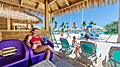 Perfect Day Coco Cay Oasis Lagoon Cabana Woman Enjoying Cocktail