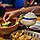 Sabor Woman Enjoying Guacamole and Margaritas