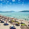 People enjoying a beach in Sanya, China