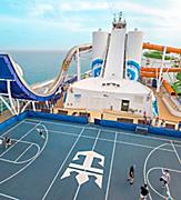 Men Playing Basketball in the Sports Court  with Tidal Wave in the Background