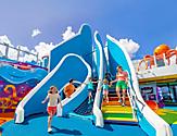 WN, Wonder of the Seas, family fun at Playscape, daytime, mother and daughter on stairs, one child running, dad watching daughter on ropes, blue colors, octopus statue in right background,